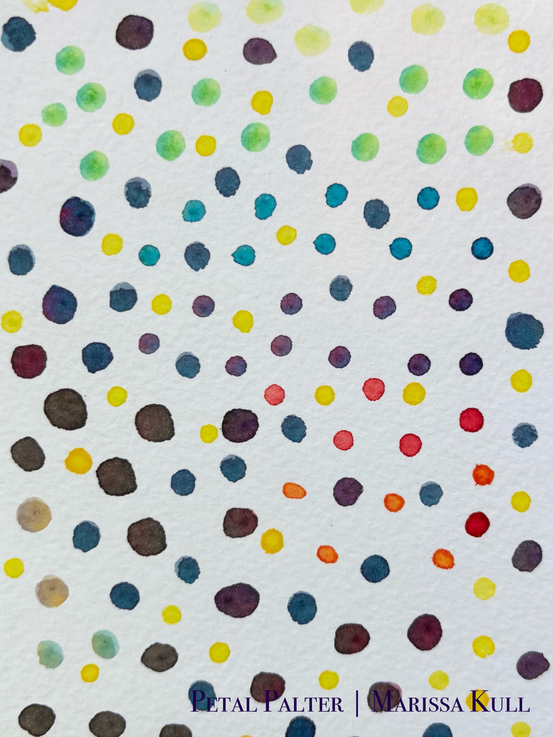 Multi-colored polka dots in varying sizes.