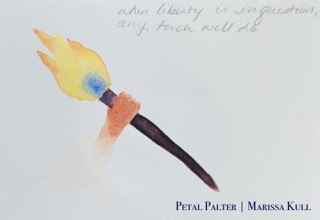 Hand holding a torch