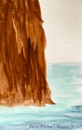 Brown cliffside that drops directly into blue and aqua ocean waves.